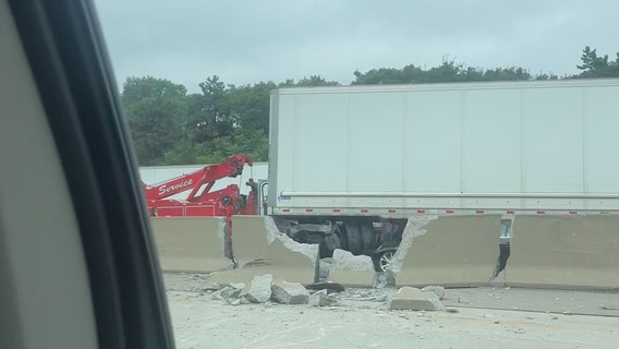 Jackknifed semi-truck blocks traffic for westbound I-696 in Warren