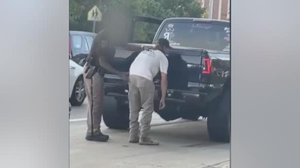 Deputy gives Dream Cruise driver a spanking after he did burnout on Woodward