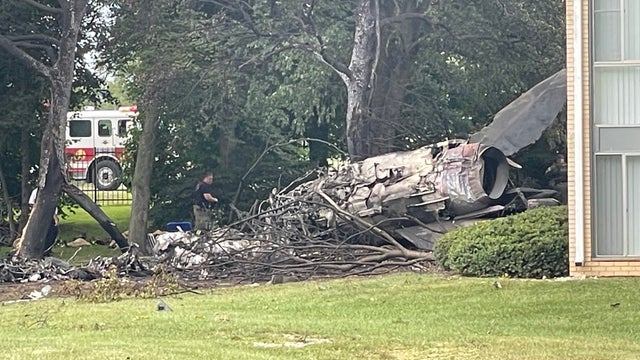 Michigan air show crash being investigated by federal safety officials after pilots eject from MiG-23