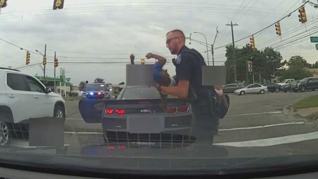 Watch: Warren police video captures moment baby is saved by officer