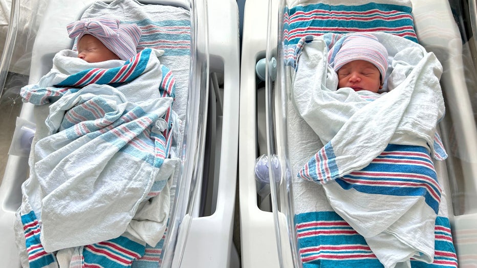 Double delight: Newborn twins share precious birthday with overjoyed parents