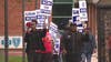Blue Cross Blue Shield workers continue strike for better wages, end of tiers