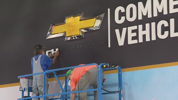 As Detroit Auto Show is built, shadow of UAW strike hangs over auto industry