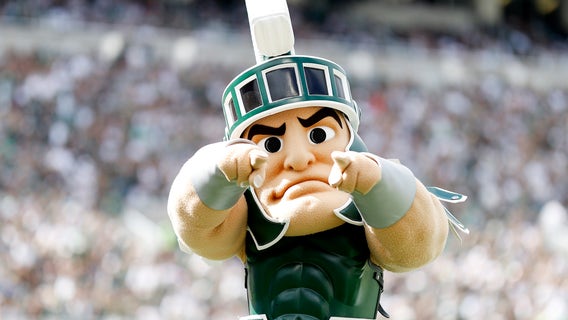 Penix leads No. 8 Washington in 41-7 rout of Michigan State, playing without suspended coach
