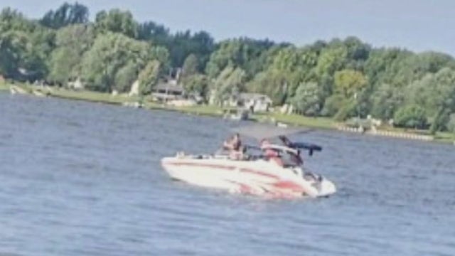 Boater flashes police badge after running over jet ski in Genesee County