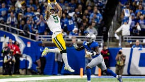 Love ties career high with 3 TD passes, leads Packers to 29-22 win over NFC North-leading Lions