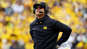 Michigan will be without coach Jim Harbaugh against Penn State after no court ruling to lift his ban