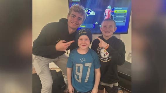 7-year-old battling leukemia forges special bond with Michigan quarterback