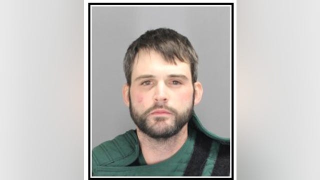 Man charged with assault after 11-hour police standoff in Oakland County