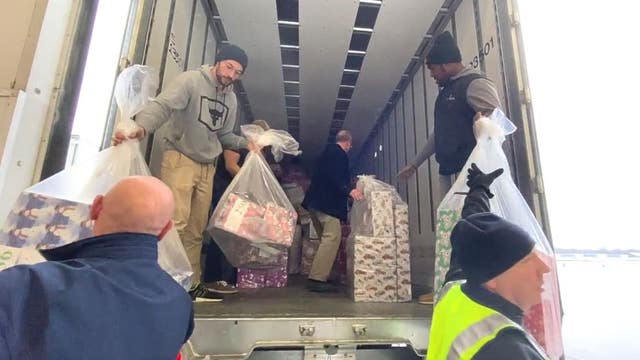 Waterford air hangar full of gifts for foster kids furthers one man's legacy