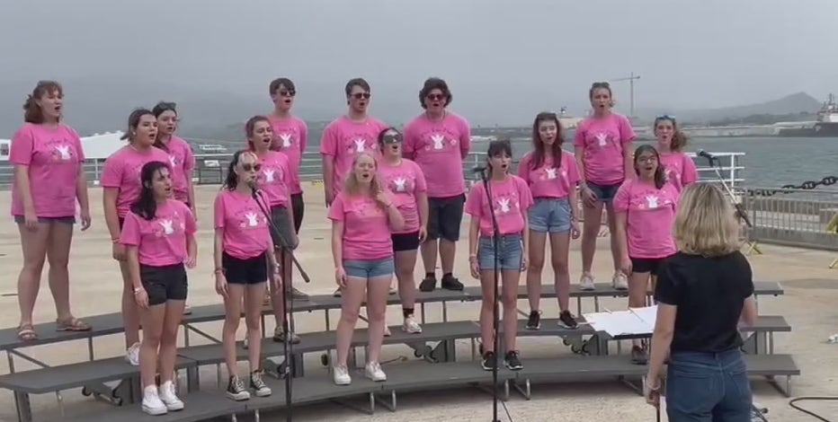 Michigan HS choir honors former director and her dream on National Pearl Harbor Remembrance day