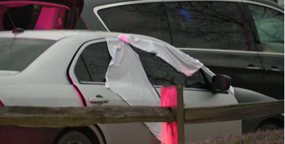 One dead, with multiple gunshot wounds, found in car in Wayne