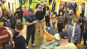 U-M Coach Harbaugh, players visit CS Mott's Children's Hospital