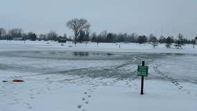 12-year-old boy rescued after falling through ice on Dundee pond
