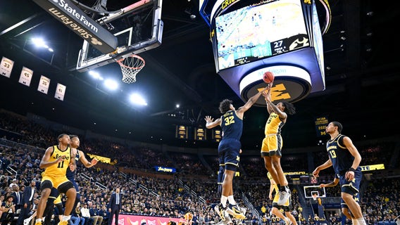 Sandfort scores 26, Perkins 24 and Iowa topples Michigan 88-78