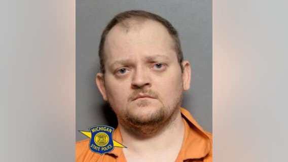 State police: Mio man charged for hitting, choking his son