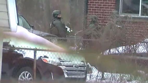 Barricaded Taylor gunman surrenders after being shot by police in gunfire exchange