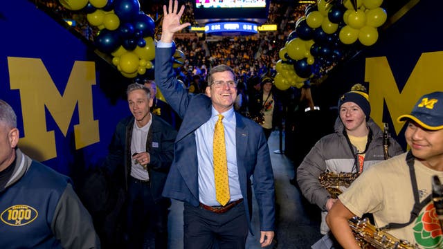 Harbaugh returning to NFL to coach Chargers after leading Michigan to national title, AP sources say