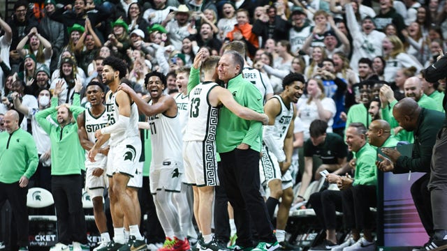 Michigan St. snaps two-game skid thumping Rutgers as walk-on Izzo scores first career points