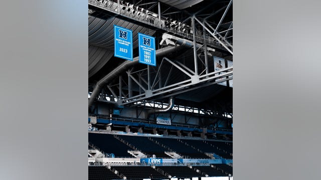 Detroit Lions hang NFC North champions banner at Ford Field