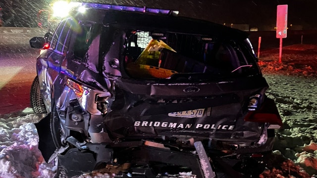 Driver loses control on I-94, crashes into Michigan police officer helping others who slid off freeway