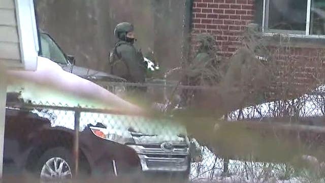 Barricaded Taylor gunman surrenders after being shot by police in gunfire exchange