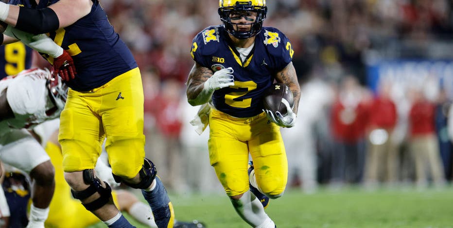 Michigan defeats Alabama 27-20 in overtime playoff semifinal at Rose Bowl