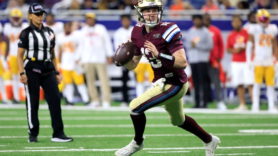 DETROIT, MICHIGAN - JUNE 18: E.J. Perry #13 of the Michigan Panthers looks to pass against the Philadelphia Stars during the fourth quarter of the game at Ford Field on June 18, 2023 in Detroit, Michigan. (Photo by Justin Casterline/USFL/Getty Images)