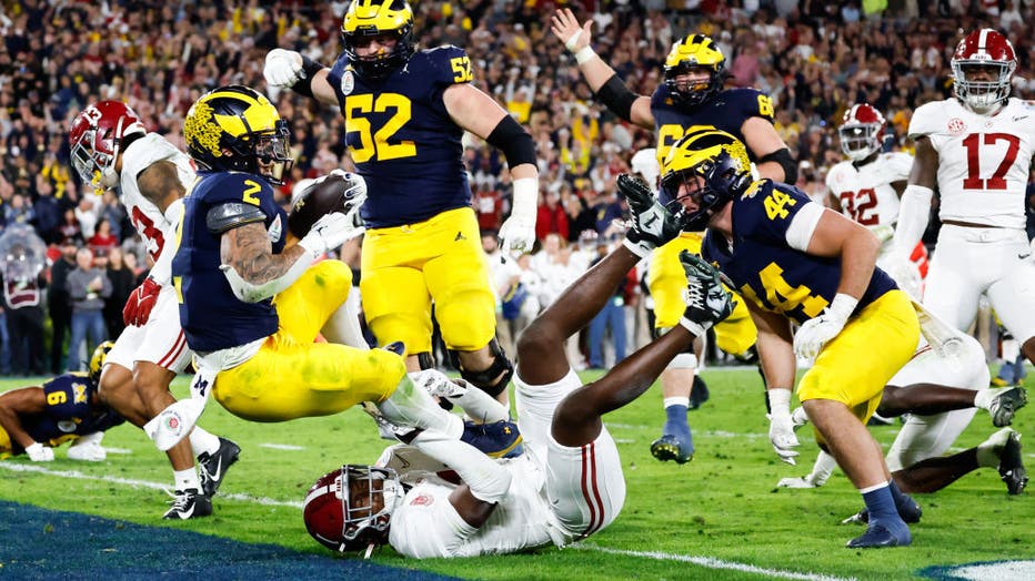 Michigan defeats Alabama 27 20 in overtime playoff semifinal at