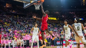 Simpson scores 19, Rutgers rallies from 15-point deficit to beat Michigan 69-59