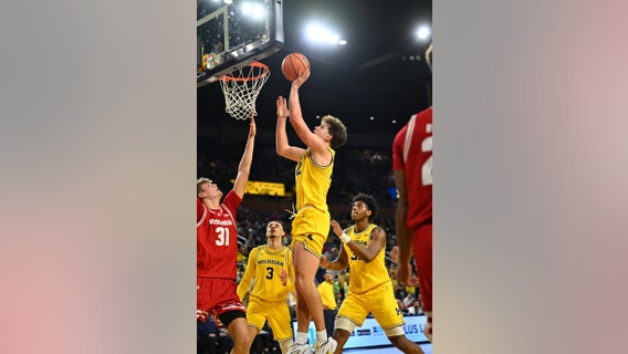 Michigan beats No. 11 Wisconsin 72-68, avoiding another 2nd-half collapse under coach Juwan Howard
