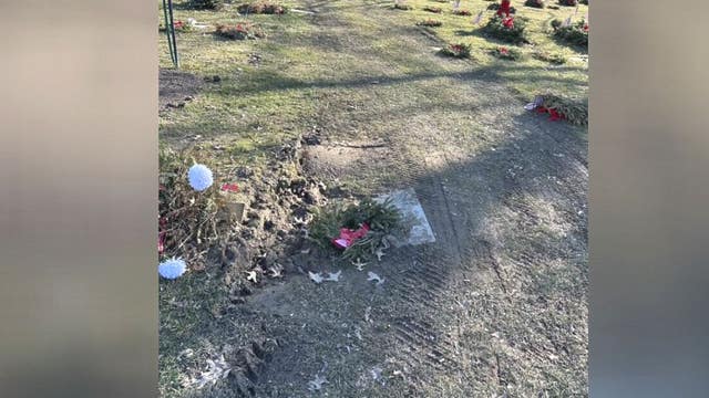 Cemetery markers, wreaths and flowers found driven over in Clinton Township