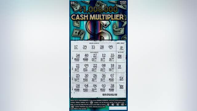 Oakland County man plans to buy house, sponsor child overseas after winning $1 million Michigan Lottery prize