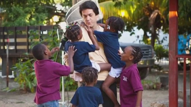 Mitch Albom recounts escaping Haiti: 'Big rugby scrum inside this helicopter'