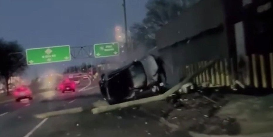 Roll-over crash on 8 Mile caught on dashcam, witnesses rush to help