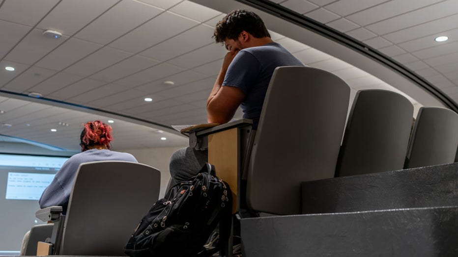 FILE - A student takes his final exam in a lecture hall at the University of Texas at Austin on Feb. 22, 2024 in Austin, Texas. (Photo by Brandon Bell/Getty Images)