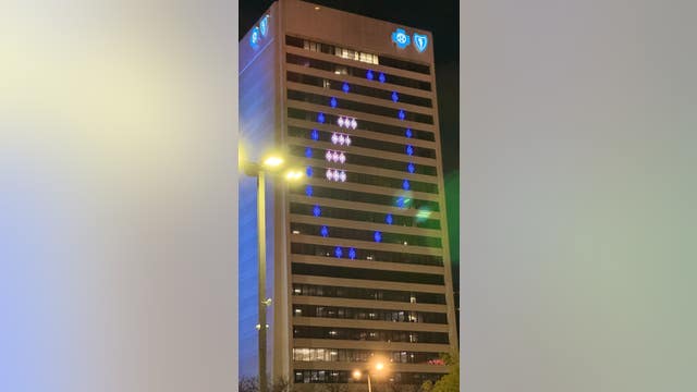 Blue Cross Blue Shield building lights up Honolulu Blue ahead of NFL Draft
