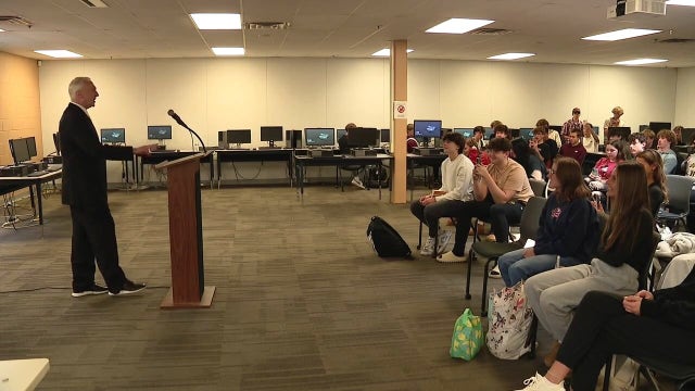 Rob Wolchek teaches high school students another 'Scam School' lesson