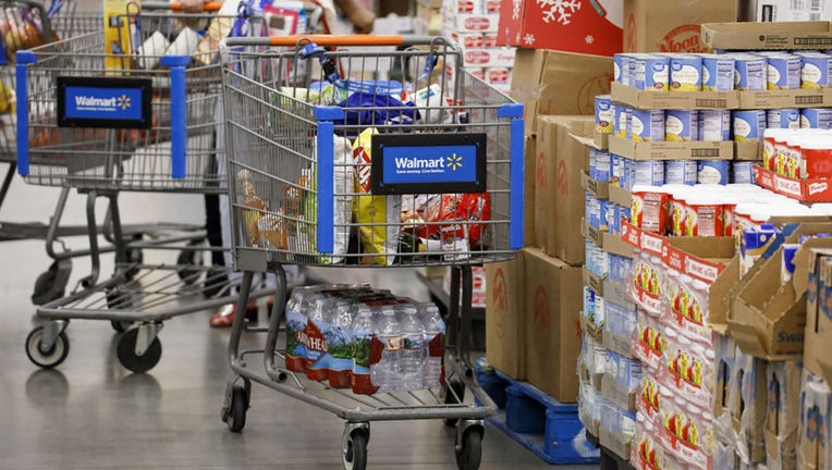 FILE - Groceries sit inside a shopping cart at a Walmart Inc. store in Burbank, California, on Nov. 19, 2018. Photographer: Patrick T. Fallon/Bloomberg via Getty Images