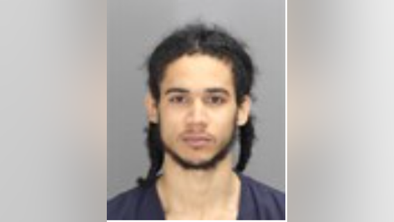 Man brandishes gun at high school students, flees with adult son