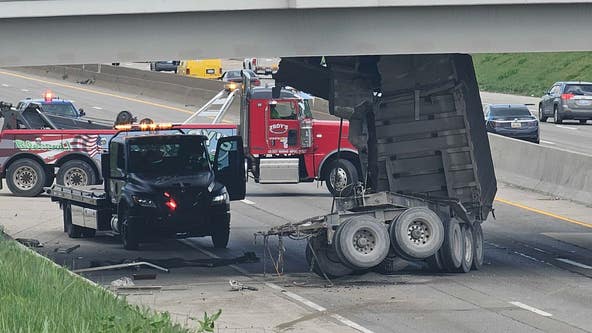 Video shows moment truck hauling gravel hits overpass on I-94 in Detroit