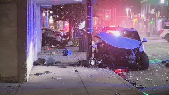 Suspected drunk driver runs red light in Detroit, slams into sedan carrying two people