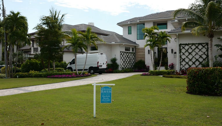 FILE - A house for sale in the Aqualane Shores neighborhood of Naples, Florida, US, on Feb. 13, 2024. Photographer: Lisette Morales McCabe/Bloomberg via Getty Images