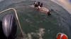 VIDEO: 4 rescued from capsized boat on Lake St. Clair