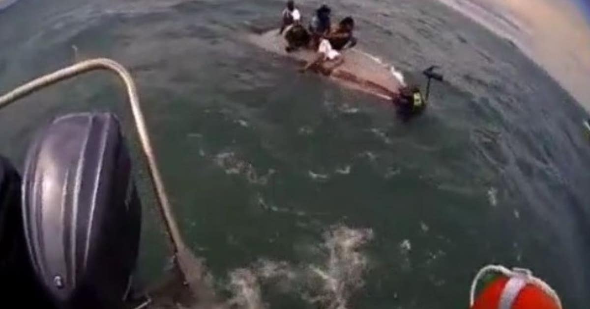 VIDEO: 4 rescued from capsized boat on Lake St. Clair | FOX 2 Detroit