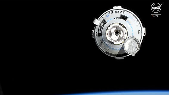 Boeing Starliner spacecraft docks at ISS with NASA astronauts after dramatic approach