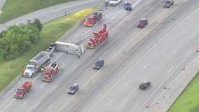 Trailer flips after malfunctioning, hitting I-96 bridge in Detroit