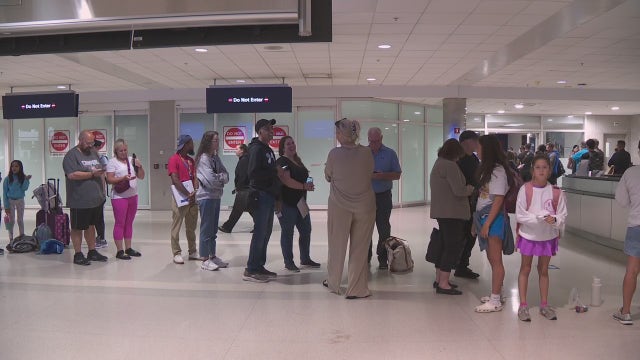 Travelers at DTW wait over 6 hours for luggage amid global tech outage
