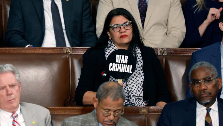 Rashida Tlaib Holds Sign Calling Netanyahu A 'war Criminal' During ...