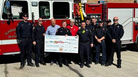 Dearborn Heights Firefighters donate $10,000 to childhood burn victim camp